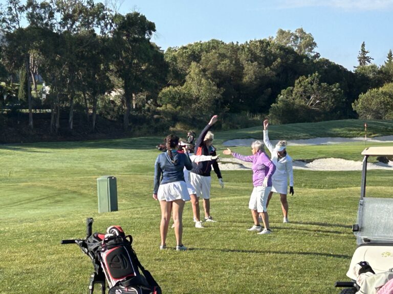 a group of women golfers on the golf course